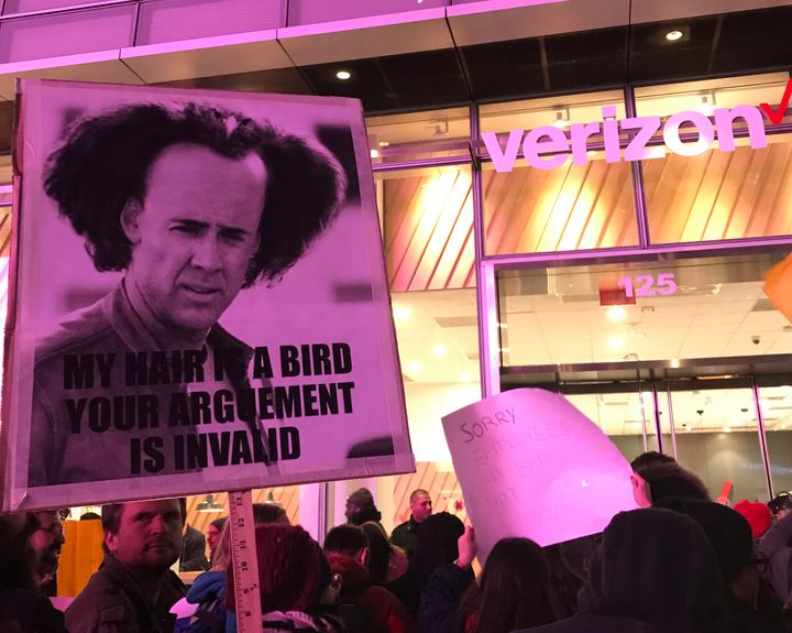 Net neutrality supporters gather at a rally in front of a Verizon store on 42nd Street in New York City on Dec. 7.