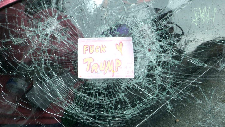 A destroyed car window in downtown Washington of a limo that was later set on fire following the inauguration of President Donald Trump on Jan. 20, 2017.