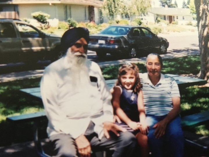 Didbal's daughter poses with Didbal's parents.