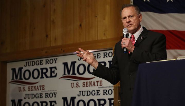 Republican Senate candidate Roy Moore campaigns in Fairhope, Alabama in December. A new MapLight analysis found that outside spending supporting Moore has surged since December.