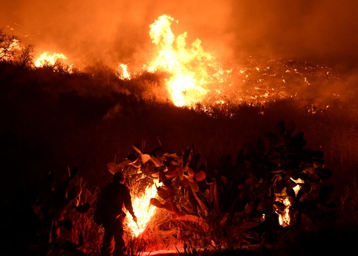 Firefighters battle the Santa Ana wind-driven Thomas fire near Ventura, California, on Dec. 5, 2017.