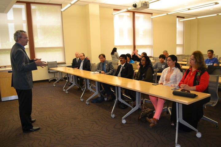 Then-School of International Service Dean James Goldgeier welcomes the Cholistan Development Council to American University f