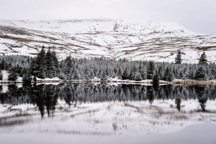 Snow covers the landscape over the Brecon Beacons, Wales