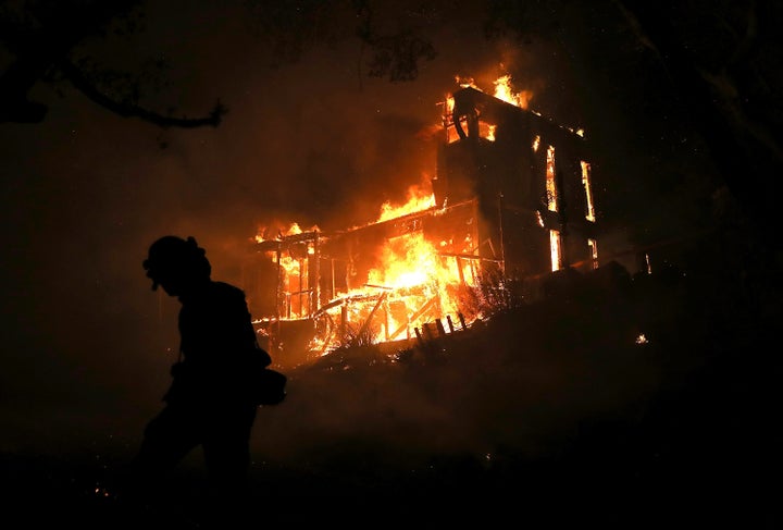 A home is consumed by fire in Ojai, California, on Dec. 7.