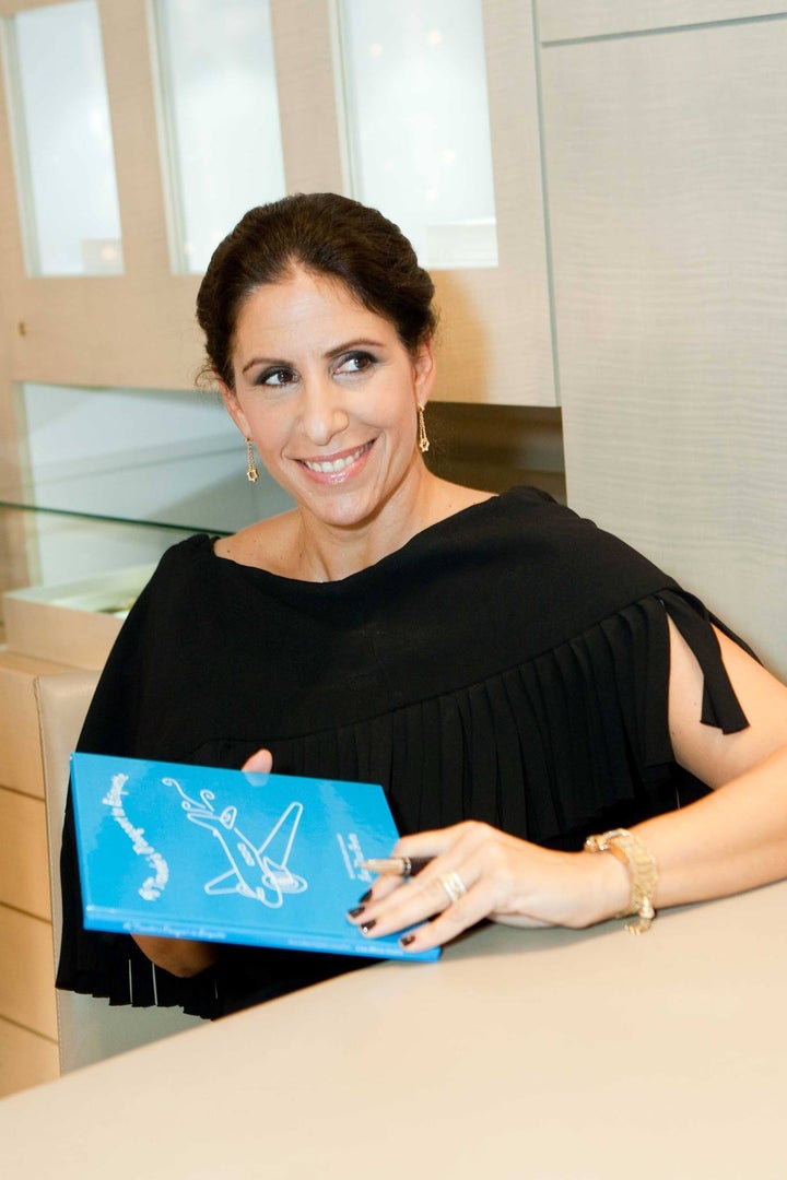 <p>Lisa Grotts with her book, A Traveler’s Passport to Etiquette, available on <a href="https://www.amazon.com/Travelers-Passport-Etiquette-Mirza-Grotts/dp/144152472X" target="_blank" role="link" rel="nofollow" class=" js-entry-link cet-external-link" data-vars-item-name="Amazon" data-vars-item-type="text" data-vars-unit-name="5a2b1367e4b04e0bc8f3b496" data-vars-unit-type="buzz_body" data-vars-target-content-id="https://www.amazon.com/Travelers-Passport-Etiquette-Mirza-Grotts/dp/144152472X" data-vars-target-content-type="url" data-vars-type="web_external_link" data-vars-subunit-name="article_body" data-vars-subunit-type="component" data-vars-position-in-subunit="0">Amazon</a>. </p>