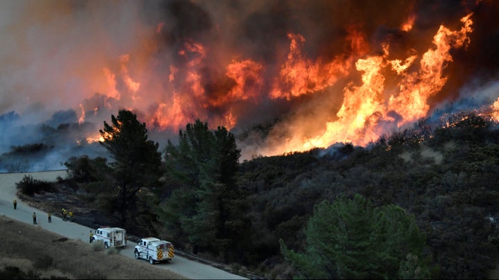 Fire fighters attack the Thomas fire’s north flank with backfires as they continue to fight a massive wildfire north of Los Angeles, near Ojai, on Dec. 9, 2017.