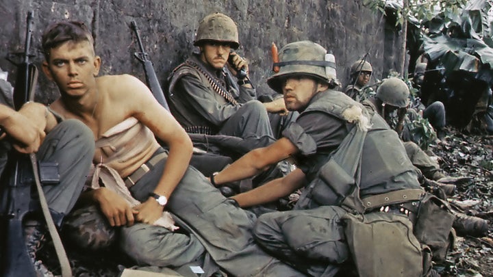 A medic treats a wounded soldier in 1967 during fighting in Hue. Have we forgotten the lessons of the Vietnam war?