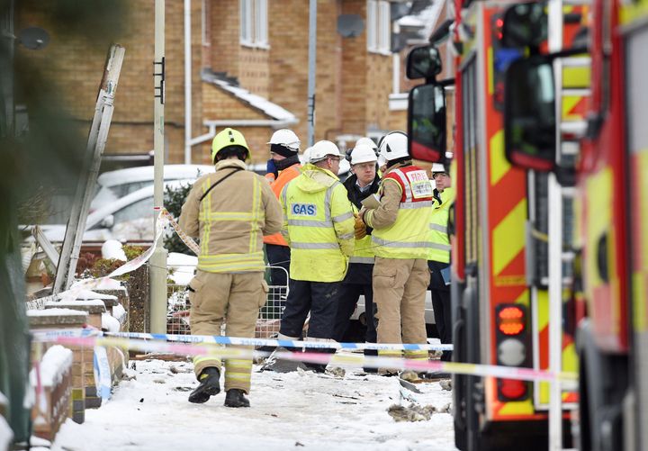 Emergency crews at the site of the explosion, which injured three people 
