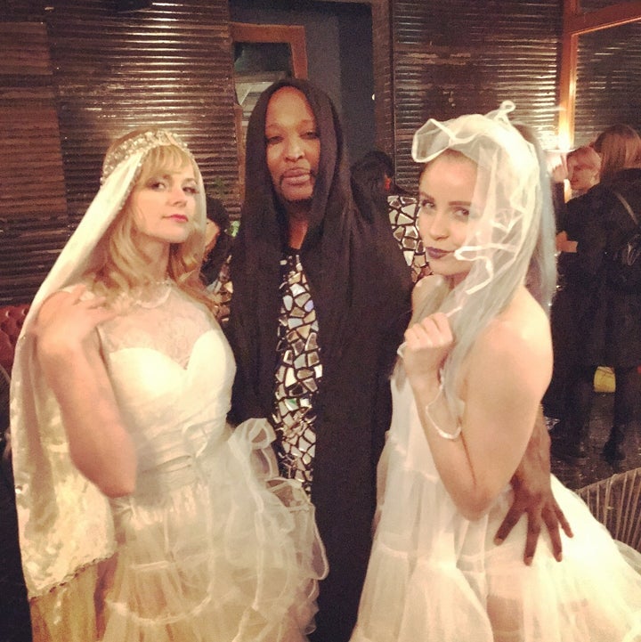 Jack Mizrahi (center) poses with Angelique Prodigy (left) and Aino Ermel (right), who competed in the category of Dramatic Bride Realness. 