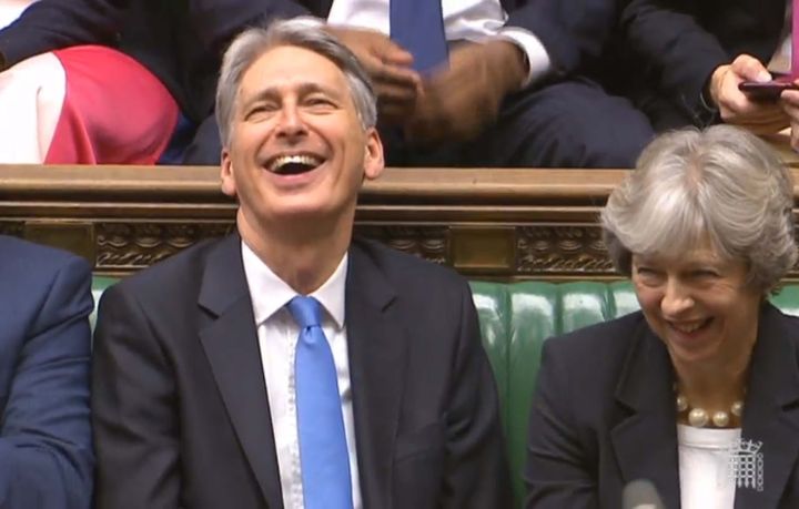 Chancellor Philip Hammond alongside Theresa May in the House of Commons