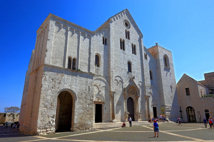 Many of St. Nicholas' remains are still buried in a crypt at the Basilica San Nicola in Bari.