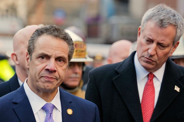 New York Mayor Bill de Blasio (R) looks on as New York governor Andrew Cuomo speaks at the press conference earlier today.