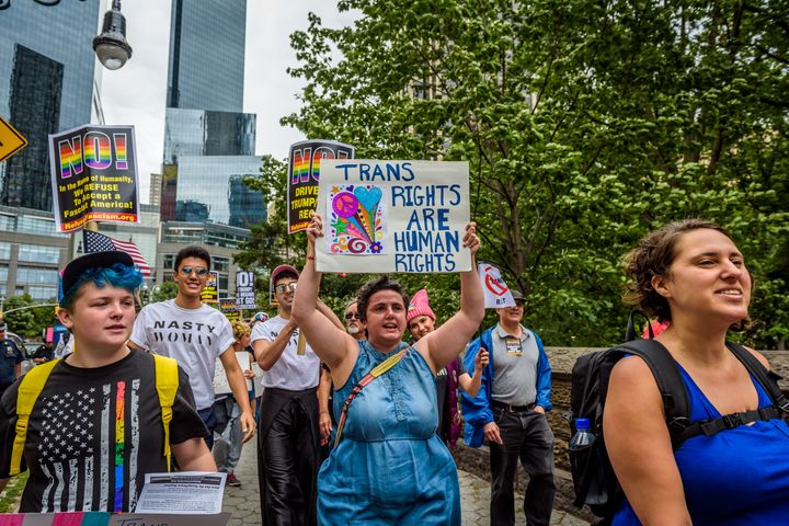 Protesters in New York in July ask the Trump administration to end discrimination toward the LGBTQ community. 
