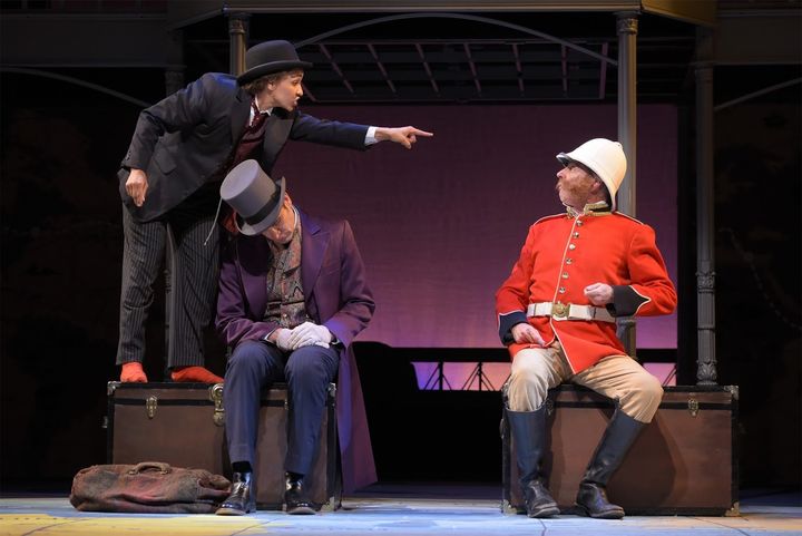 Tristan Cunningham (Passepartout), Jason Kuykendall (Fogg), and Ron Campbell (Sir Francis) in a scene from Around the World in 80 Days