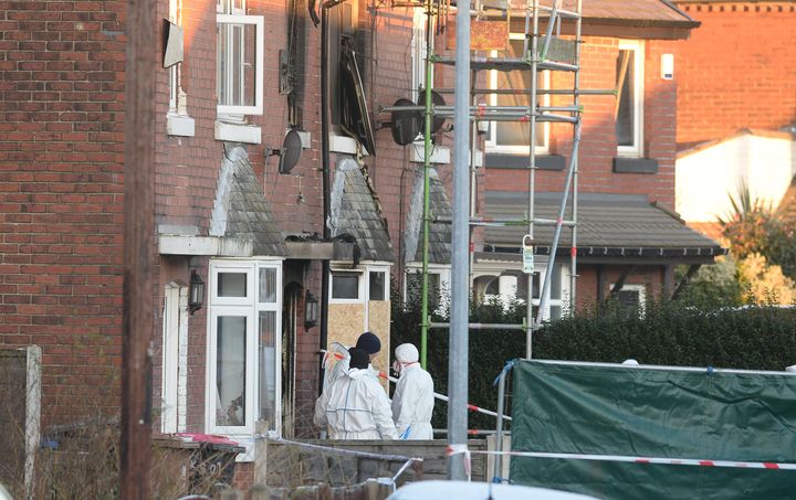 Forensic officers at the scene of the blaze in Jackson Street