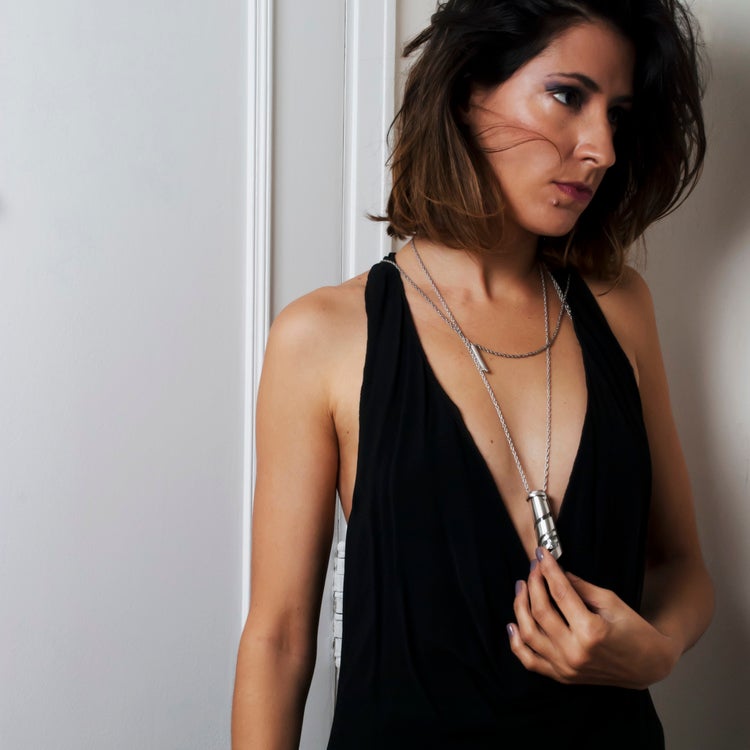 This Perfume Flacon Necklace is timeless and travel-ready.