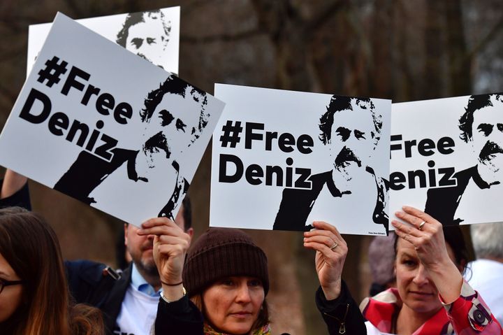Protesters in Berlin call for the release of German journalist Deniz Yücel, who has been detained in Turkey since February.