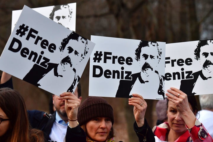 Protesters in Berlin call for the release of German journalist Deniz Yücel, who has been detained in Turkey since February.