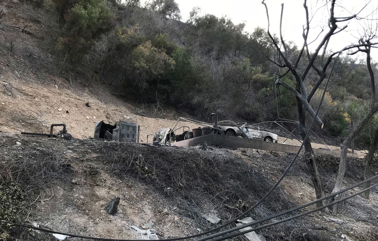 A burned-out structure and car in Southern California's Ojai Valley.