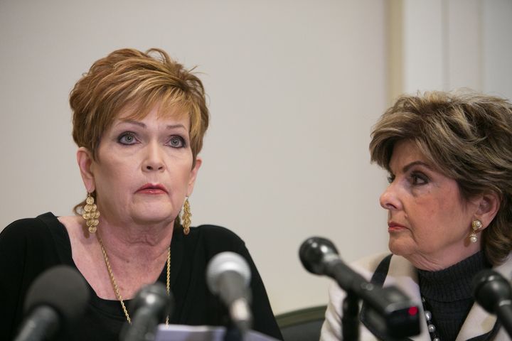 Beverly Young Nelson, left, with attorney Gloria Allred, reads a statement about her experience as a teenager with Roy Moore. She accused him of sexually assaulting her when she was 16.