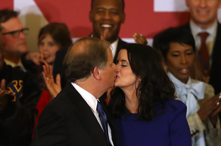 Doug Jones is congratulated by his wife, Louise, on their 25th anniversary Tuesday. Or maybe she's congratulating him on his Senate win.