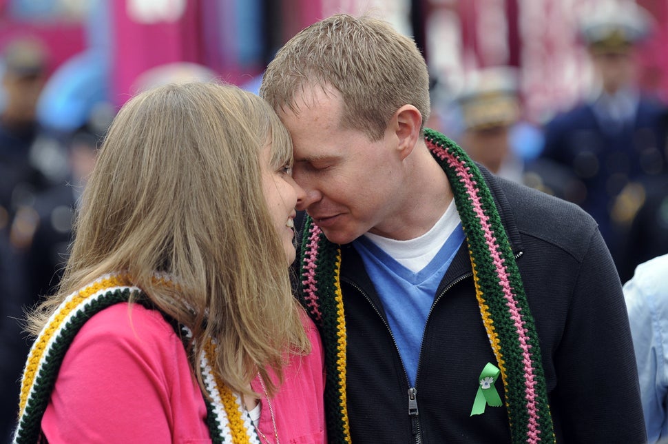 Michele Gay and Alissa Parker (pictured here with husband Robbie) lean on their families and each other for support during hard times.