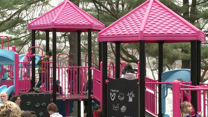 As new playground opens in New London, CT, children play on playground built as a memorial to Emilie Parker, November 17, 201