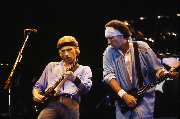 Mark Knopfler and Jack Sonni of Dire Straits perform in this undated photo.