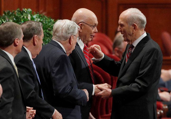 Mormon Apostle Russell M. Nelson, next in line to lead the church, greets Apostle Dallin Oaks and other Mormon apostles in Salt Lake City on Sept. 30, 2017.