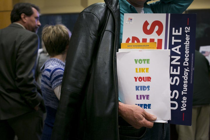 A sign at the Doug Jones victory rally.