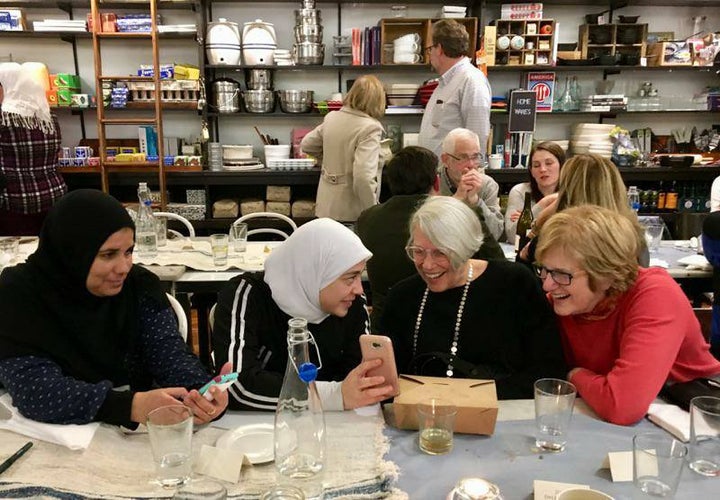 <p>Sharing stories over dinner. </p>