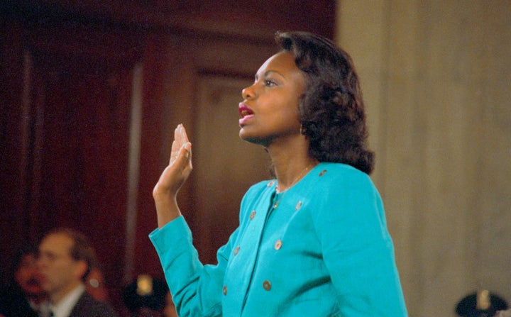 Anita Hill being sworn in before testifying at the Senate Judiciary hearing on Thomas' Supreme Court nomination.