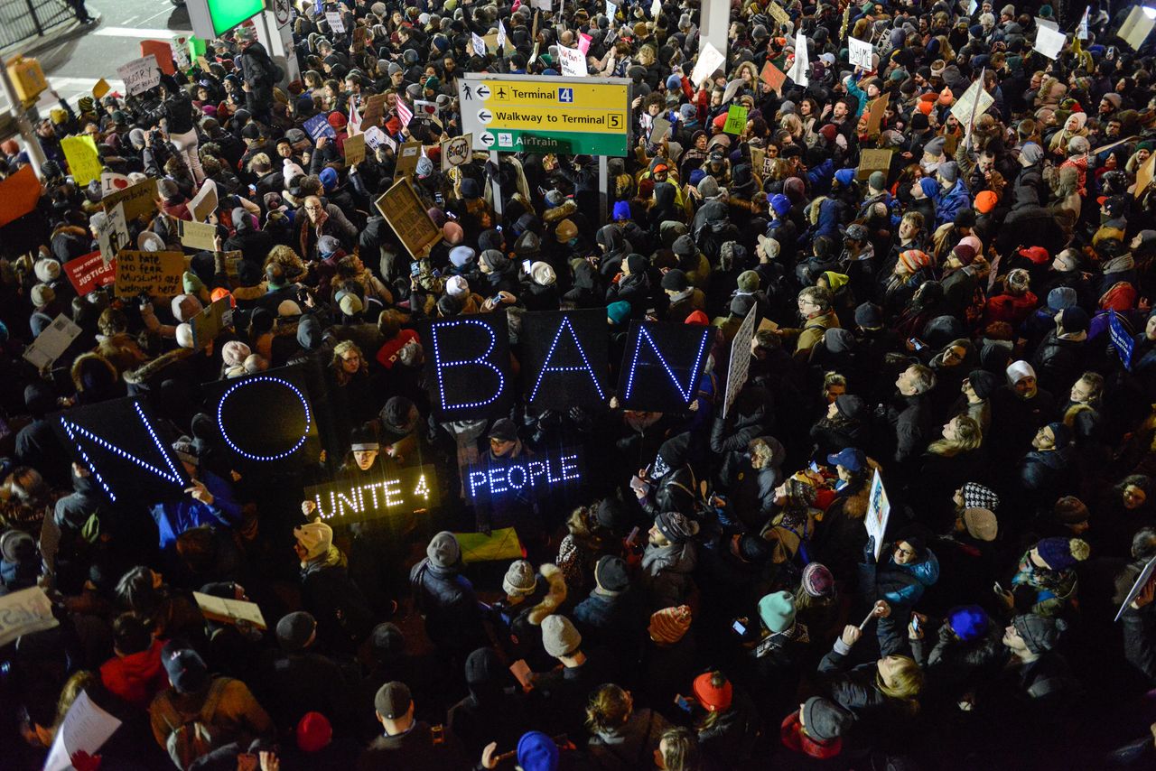 Protesters rally against Donald Trump's travel ban at John F. Kennedy International Airport in New York City on Jan. 28, 2017.