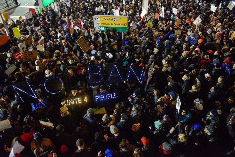 Protesters rally against Donald Trump's travel ban at John F. Kennedy International Airport in New York City on Jan. 28, 2017