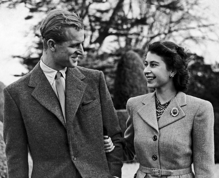 The pair walk arm in arm in November 1947.