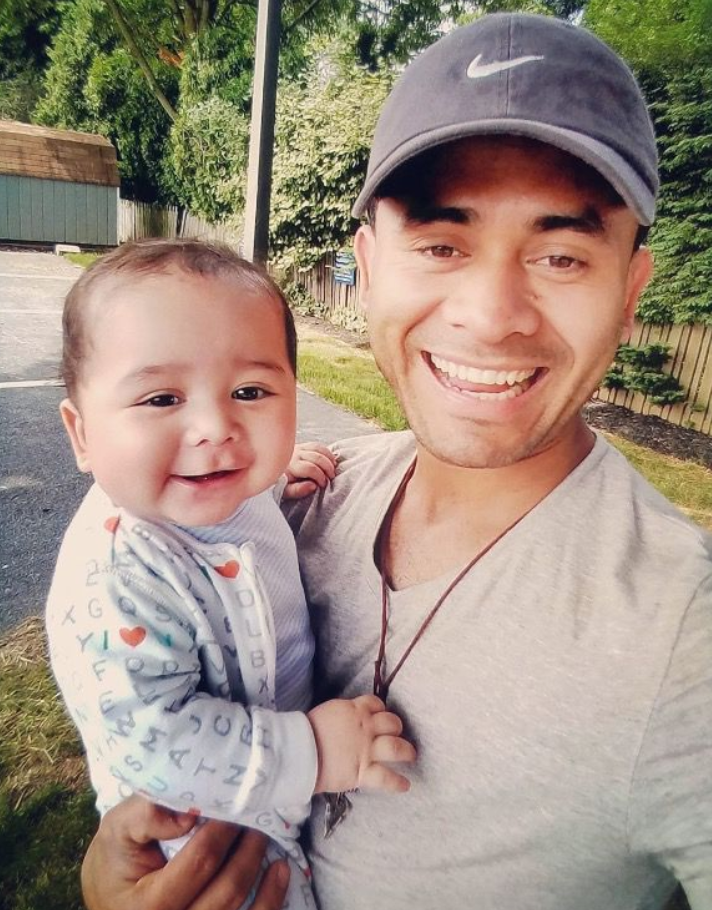 Osman Aroche Enriquez with his son