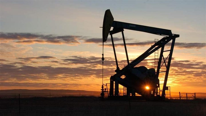 An oil derrick in Montana, one of the resource-rich Western states that would lose millions in royalty payments due to the expense of the tax bill.