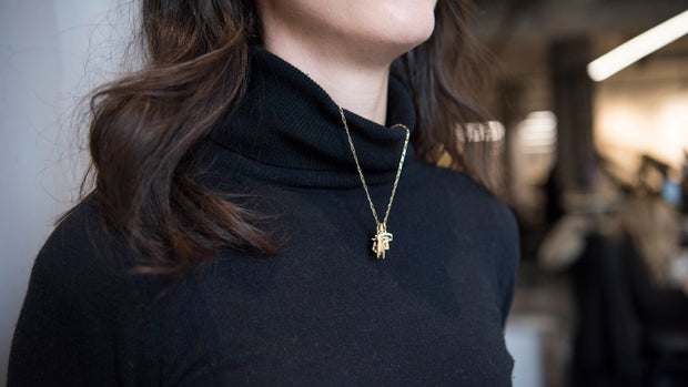How To Pull Off Wearing Necklaces With Turtlenecks, According To A Stylist