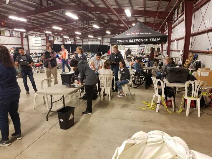 Teams of volunteers set up at a Red Cross shelter in Santa Barbara.