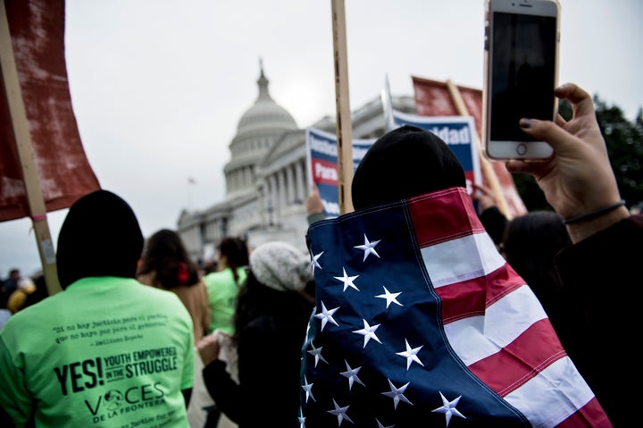 Protesters rally on Capitol Hill on Dec. 6 to call for a path to legal status for undocumented young people who came to the U.S. as children.