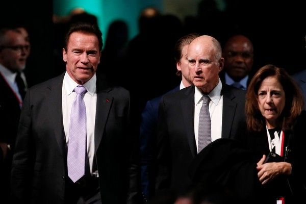Former Governor Arnold Schwarzenegger, who enacted California’s pioneering climate change program, with Governor Jerry Brown and First Lady/Special Counsel Anne Gust Brown at the One Planet Summit at La Seine Musicale in Paris. Brown delivered a keynote address to world leaders highlighting the “new normal” of year-round massive California fires in the greenhouse era. 