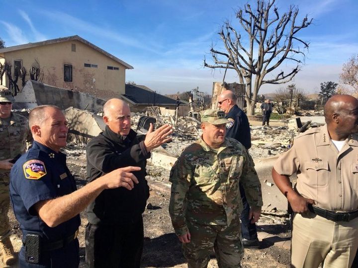 Brown surveys damage from the massive Thomas Fire outside Ventura with leaders of CalFire and the California National Guard.