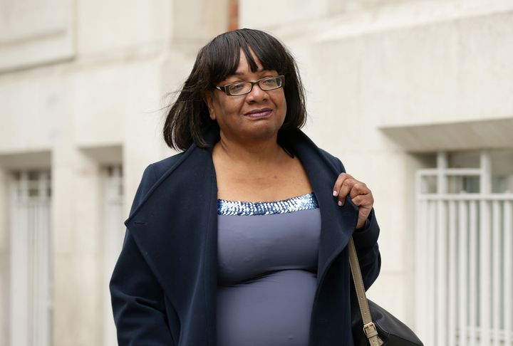 A bookmaker has been forced to apologised after sharing a picture of a man blacked-up as a Labour MP Diane Abbott.