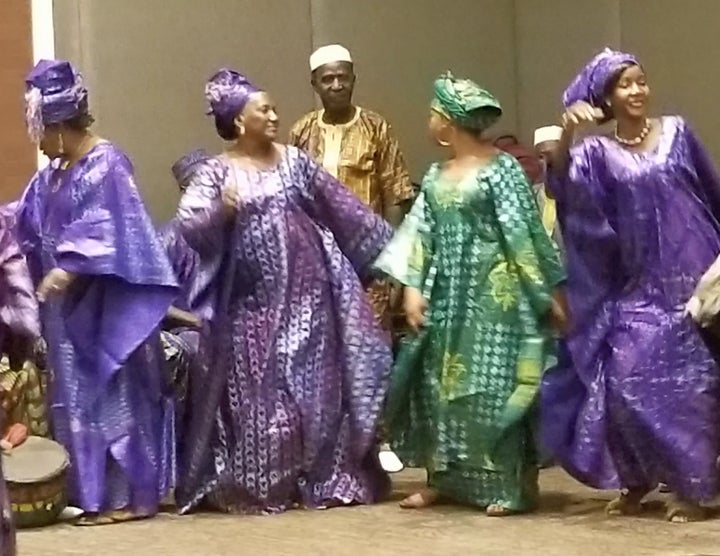 Guinean women dance at the opening of the Ouagadougou Partnership 6th annual meeting in Conakry, Guinea