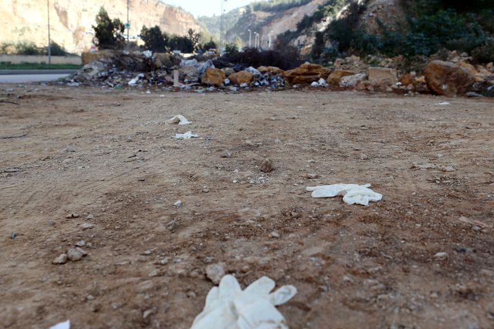 Gloves are seen on the ground at the scene where Dykes was found 