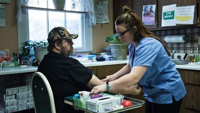 A patient has blood drawn in March at the Community Health Center of NE Wetzel County in Burton, West Virginia. Congress has