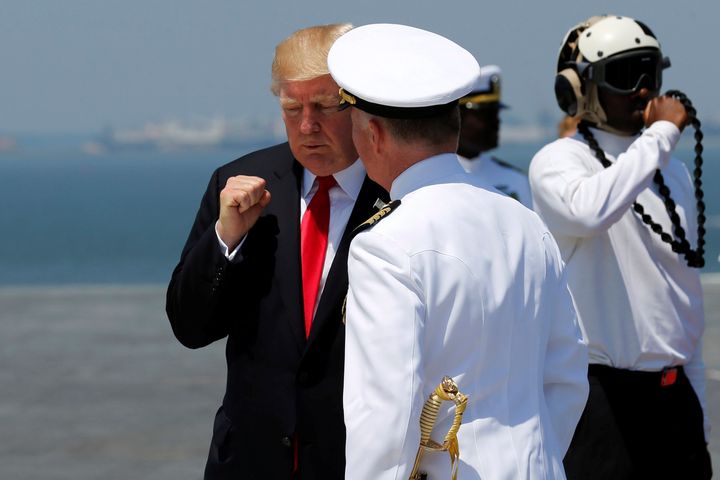 President Trump bids farewell to U.S. Navy Captain Richard McCormack after commissioning the aircraft USS Gerald R. Ford during a ceremony at the Naval Station Norfolk in Norfolk, Virginia. 