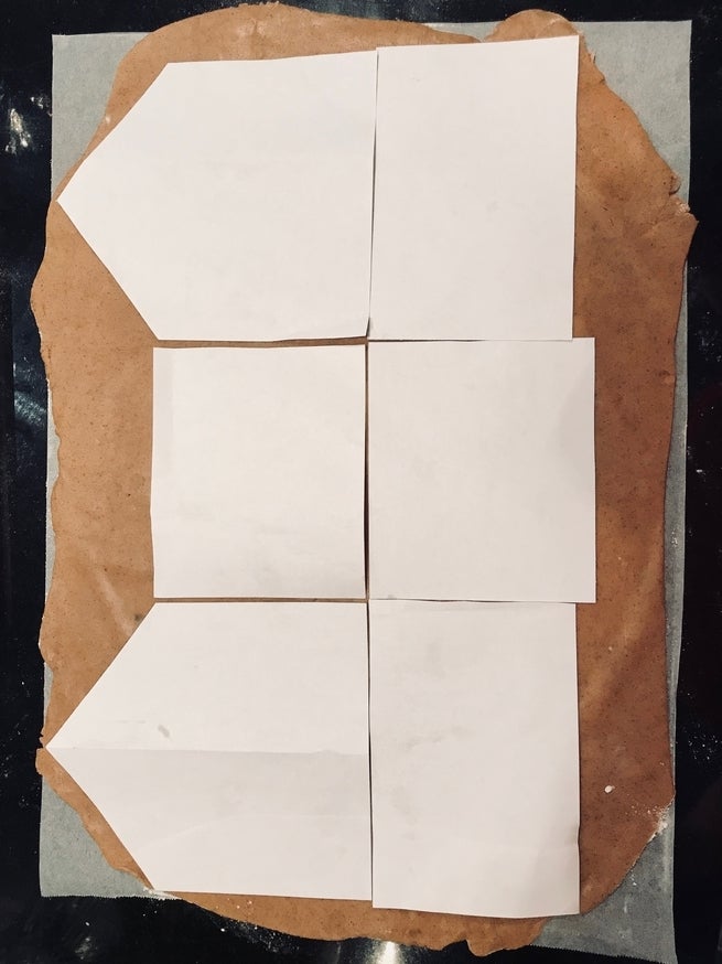 <p>We chose a pretty basic gingerbread house shape, but added two bonus triangles to act as structural supports.</p>