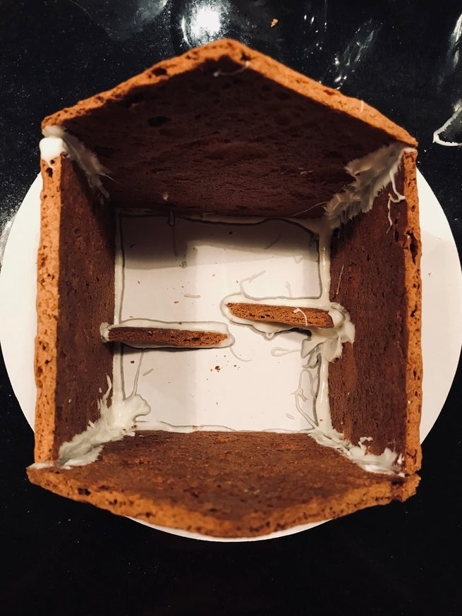 <p>To support our house, we used the little triangles as simple buttresses for the walls.</p>