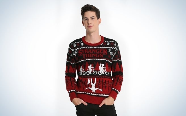 <p>The perfect get-up for your curiosity voyage.</p>
<p><a rel="nofollow" href="http://www.boxlunch.com/product/stranger-things-ugly-holiday-sweater/11089592.html?CM_MMC=CSE-_-GGL-_-MensSweaters-_-4_9999W1_CSE_GGL_MensSweaters_11089586&mr:referralID=fe656940-d90b-11e7-9798-0050569406b5&gclid=EAIaIQobChMI09eH09zw1wIV1rbACh02UAVREAQYASABEgJ8vvD_BwE" target="_blank">Buy Now!</a></p>